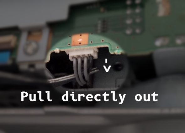 Photo showing the PSX's HDD Power cable, connected to the motherboard, with the the cable being held out with a set of tweezers.