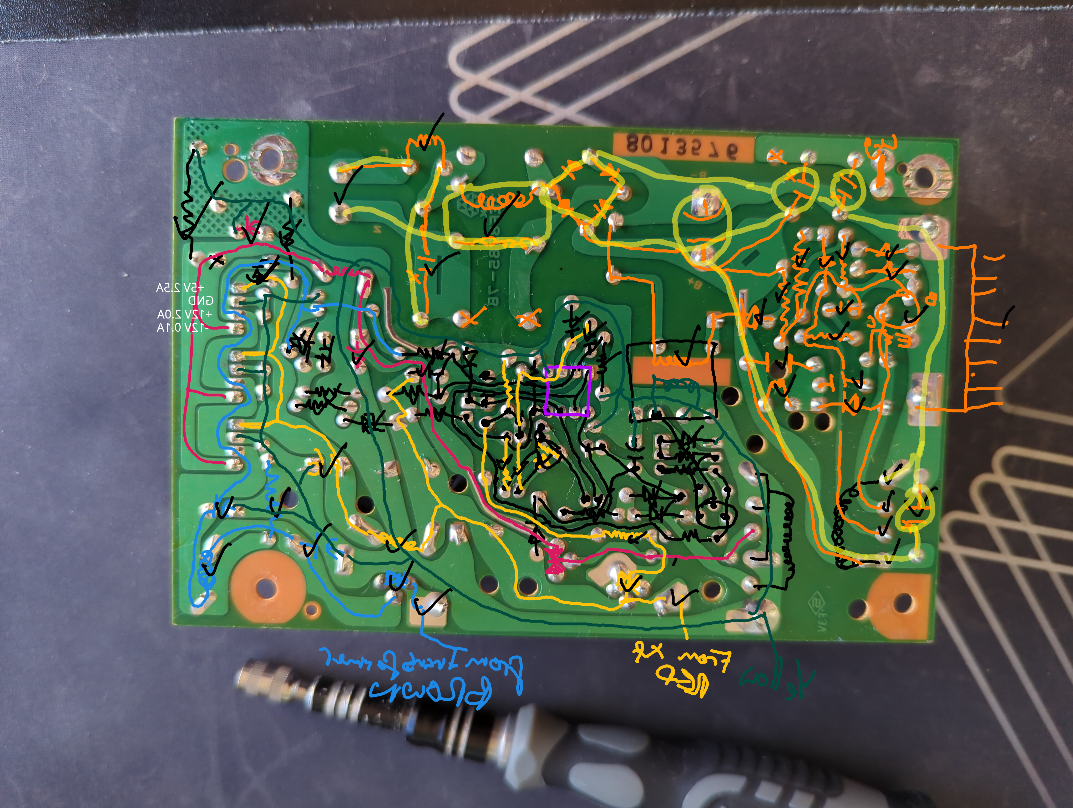 A photo showing the bottom of the power supply with the components drawn over it.